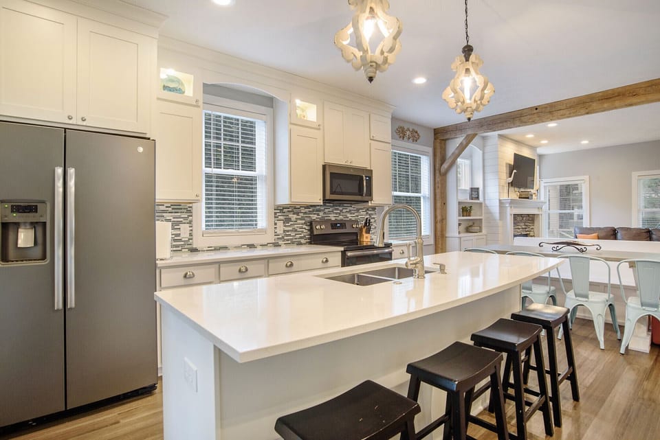 Upscale well stocked kitchen with quartz countertops 