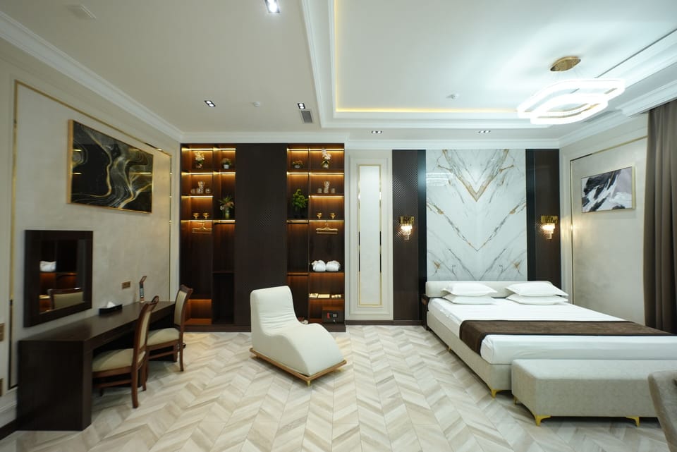 Luxury Apartment | Living area | 55-cm Smart TV with cable channels, TV, toys