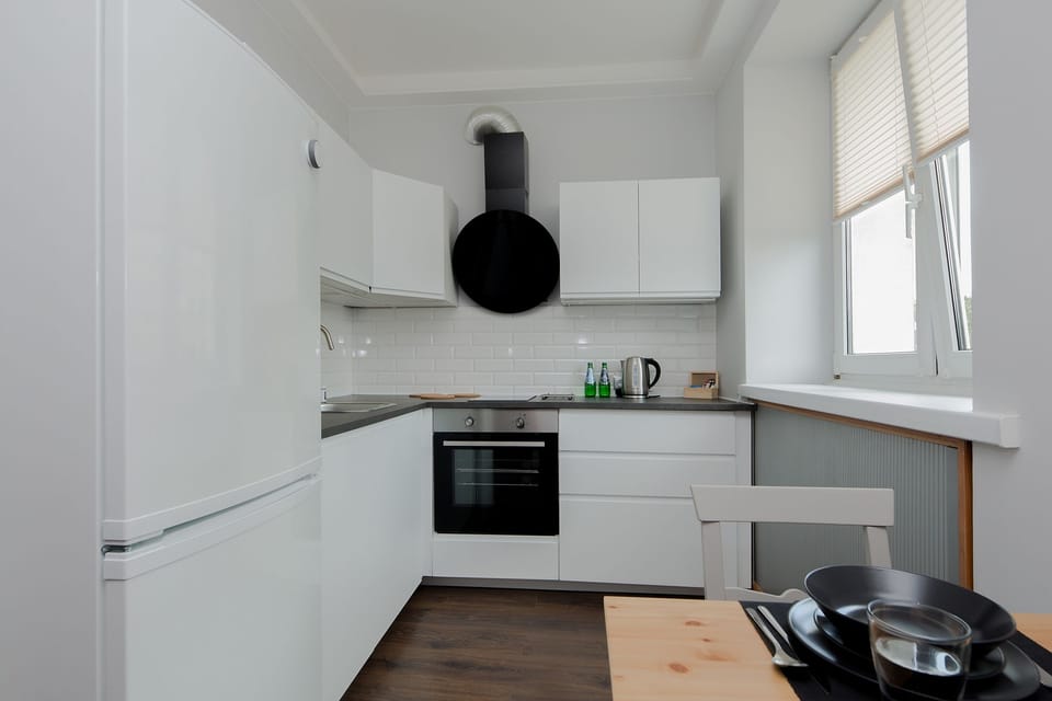 Comfort Apartment | Private kitchen | Coffee/tea maker, full-size fridge, oven, stovetop