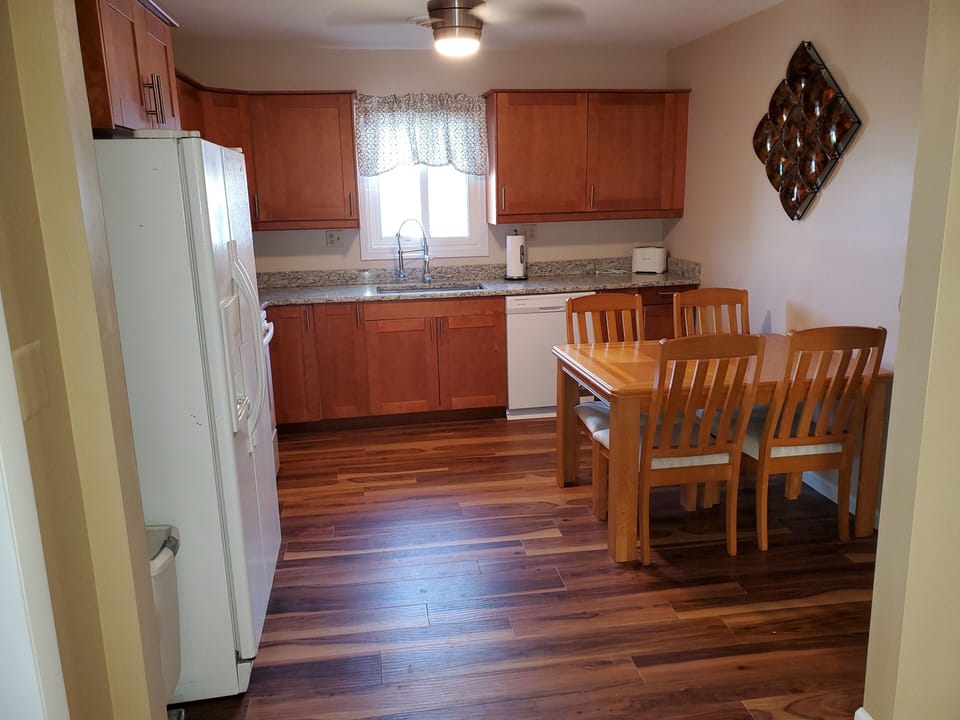 stovetop, refrigerator, indoor, coffee and or coffee maker, kitchen, 