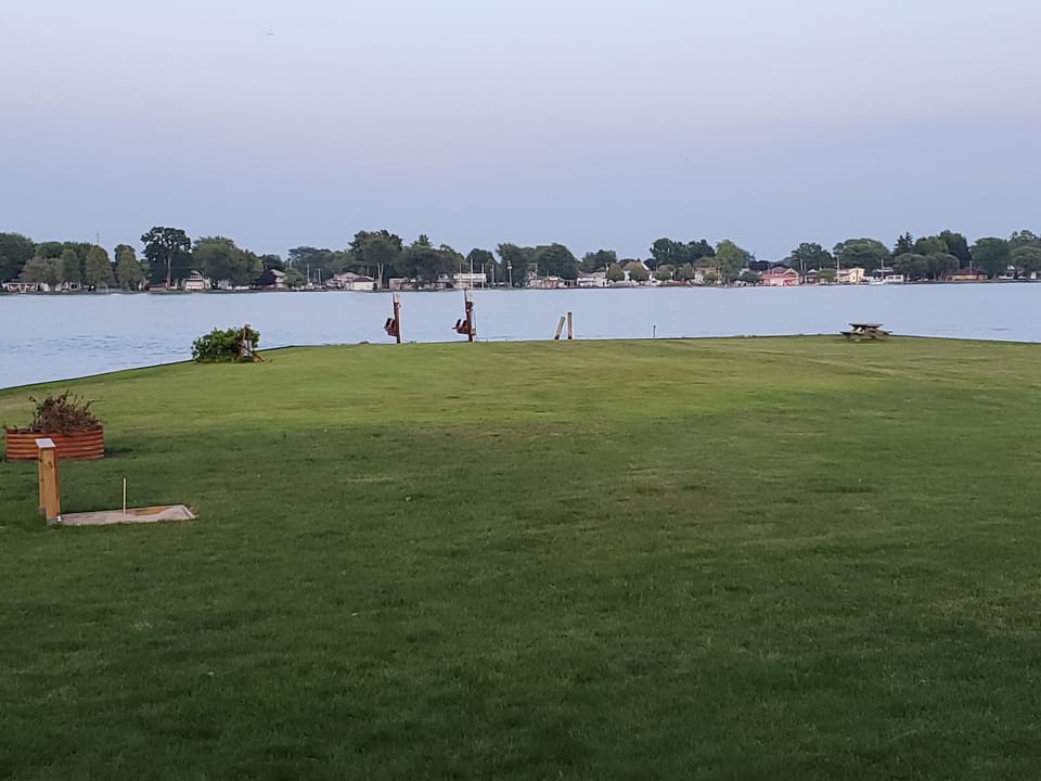 large yard on the river.