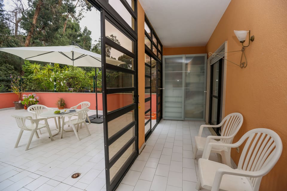 Varanda fechada com acesso ao terraço
