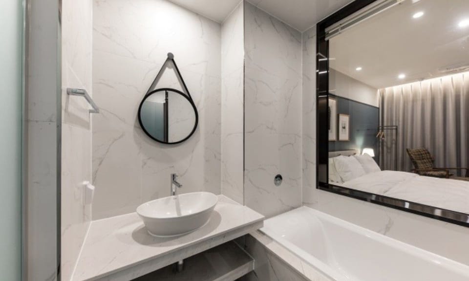 Premium Double Room (8 PM Check-in on Friday-Sunday) | Bathroom | Jetted tub, designer toiletries, hair dryer, bathrobes