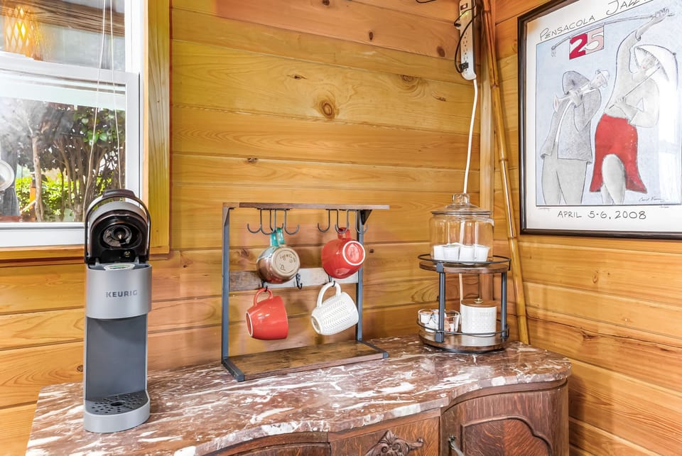 Enjoy your morning coffee with our fully stocked coffee bar! We do provide ample starter coffee to get your day going! Take your coffee with you on step outside into the backyard porch in the garden