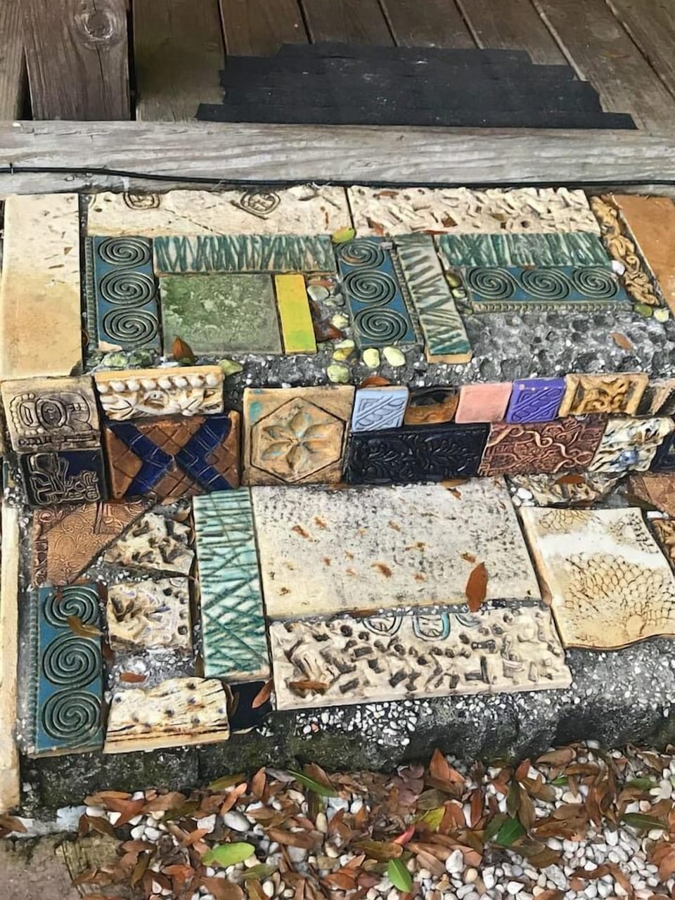 Eclectic tile and artwork scattered all through the zen garden