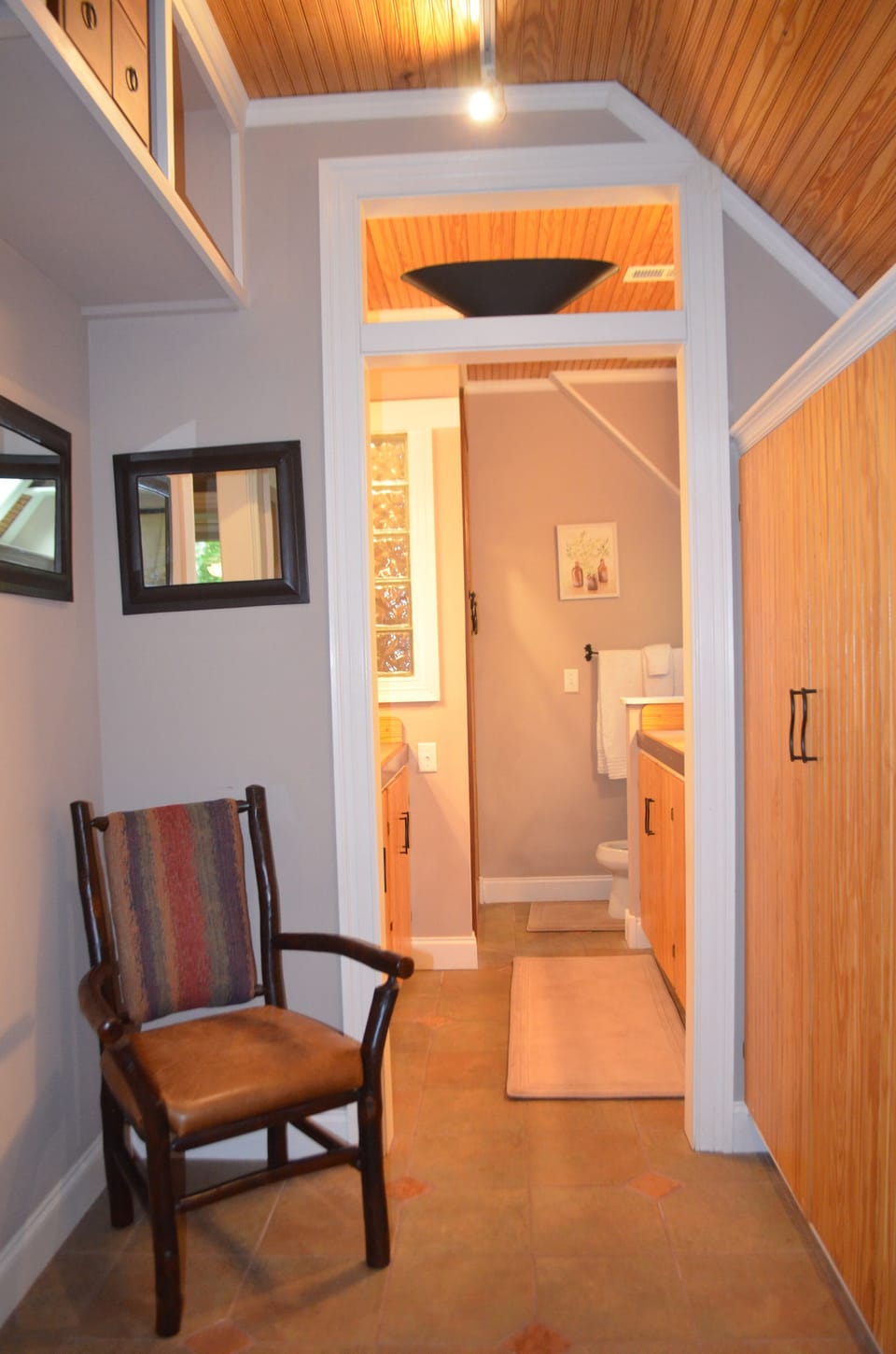 Dressing and spa tub area between master bedroom and bath. Spacious closet