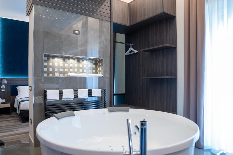 Shower, rainfall showerhead, eco-friendly toiletries, hair dryer