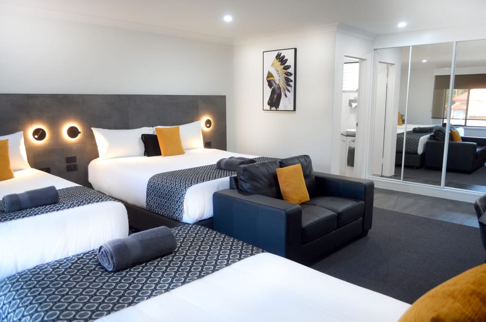 Executive Family Room | Desk, iron/ironing board, rollaway beds, free WiFi