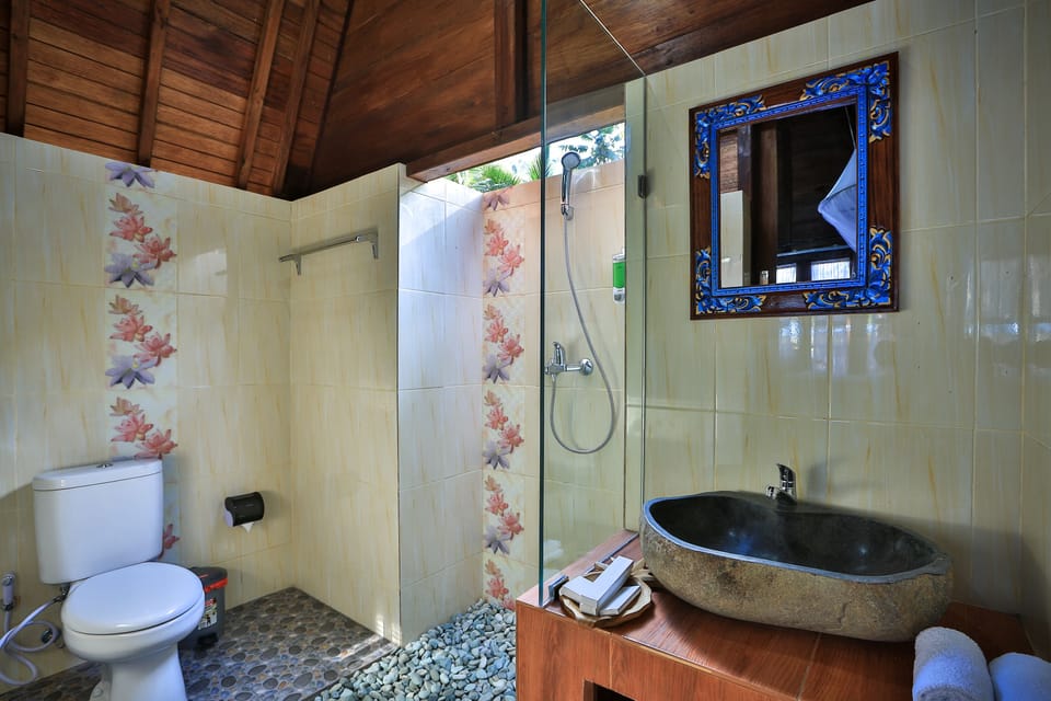 Shower, slippers, bidet, towels