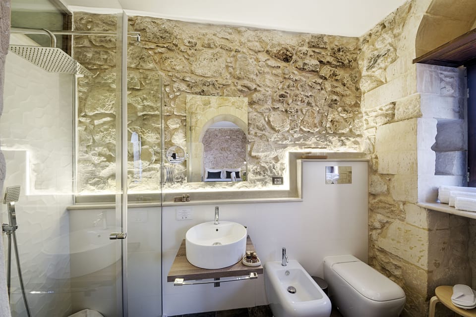 Deluxe Double Room, Balcony | Bathroom | Shower, hair dryer, bathrobes, slippers