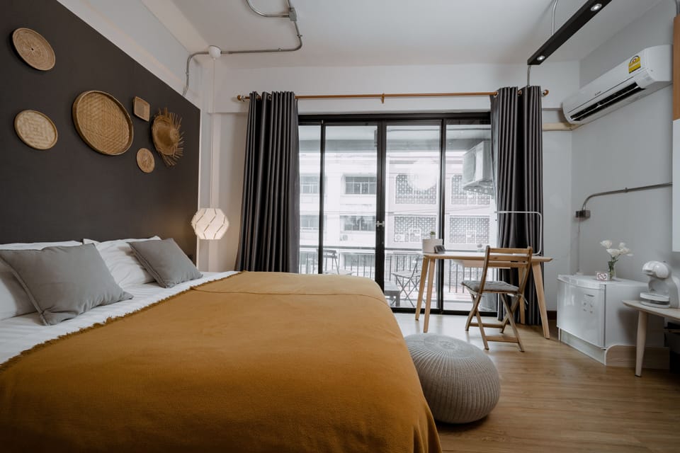 Deluxe Double Room with Balcony | Minibar, in-room safe, blackout drapes, iron/ironing board