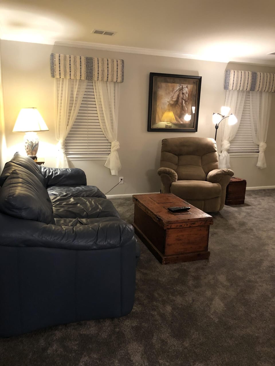 Warm, inviting, comfortable den with large TV