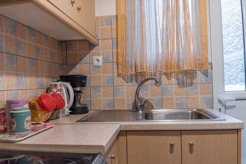 Design Apartment | Private kitchen | Full-size fridge, microwave, oven, stovetop