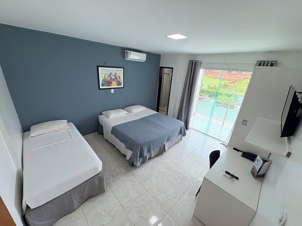 Family Room | Minibar, desk, laptop workspace, blackout drapes
