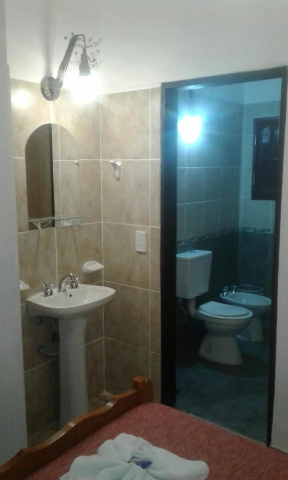 Shower, hair dryer, soap, toilet paper