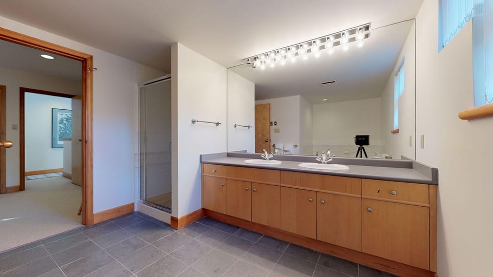 Indulge in the spa-like ensuite with elegant finishes and plenty of light.