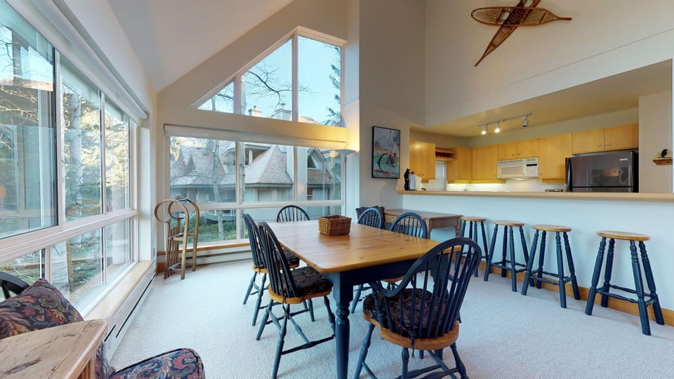 A bright and open dining space comfortably seats six for family-style dinners.