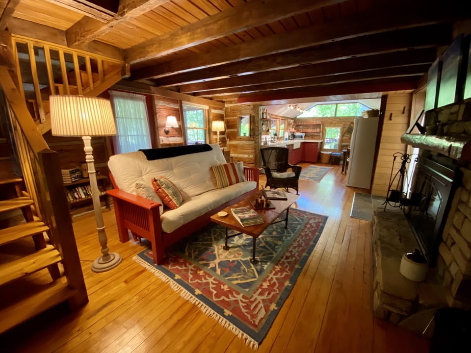 The Living Room and Kitchen are located on the Cabin's lower level.