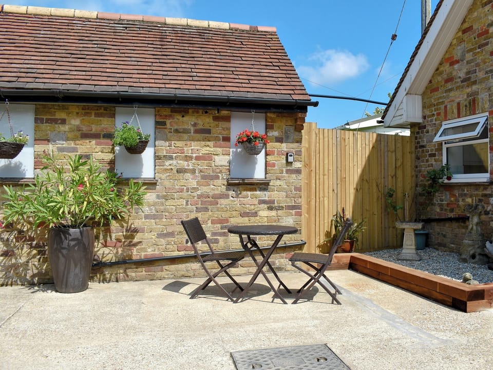 Spacious patio | Newhope, Winchelsea Beach, near Rye