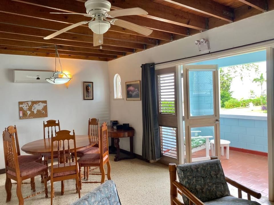 Spacious living and dining which opens out to a beachfront patio