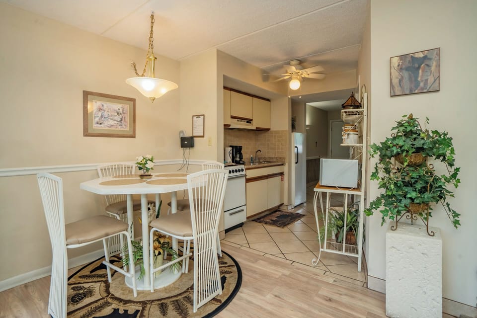 Your cozy dining nook opens into a well-equipped kitchenette, offering everything you need to prepare meals and gather for breakfast before exploring the area.