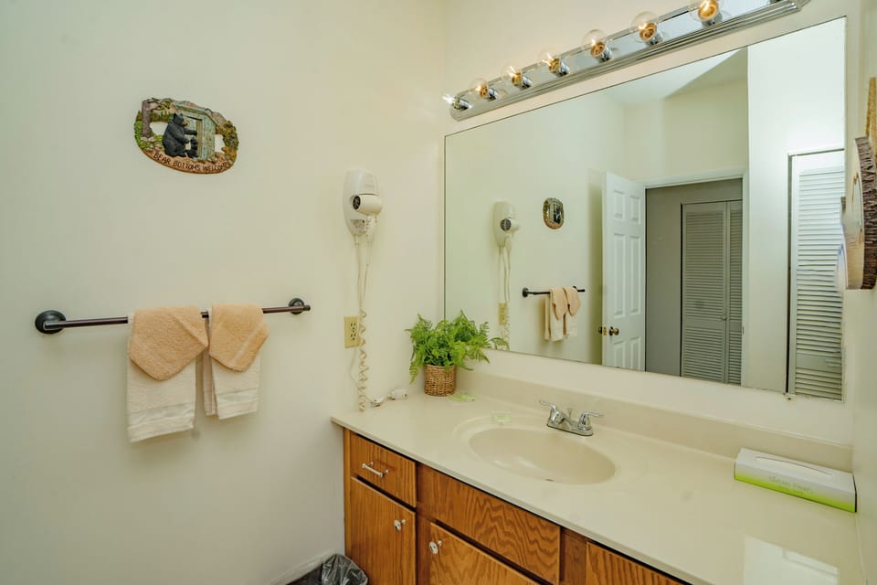 Step into your private bathroom, where fresh towels and a warm, inviting space await you after a day of adventure.