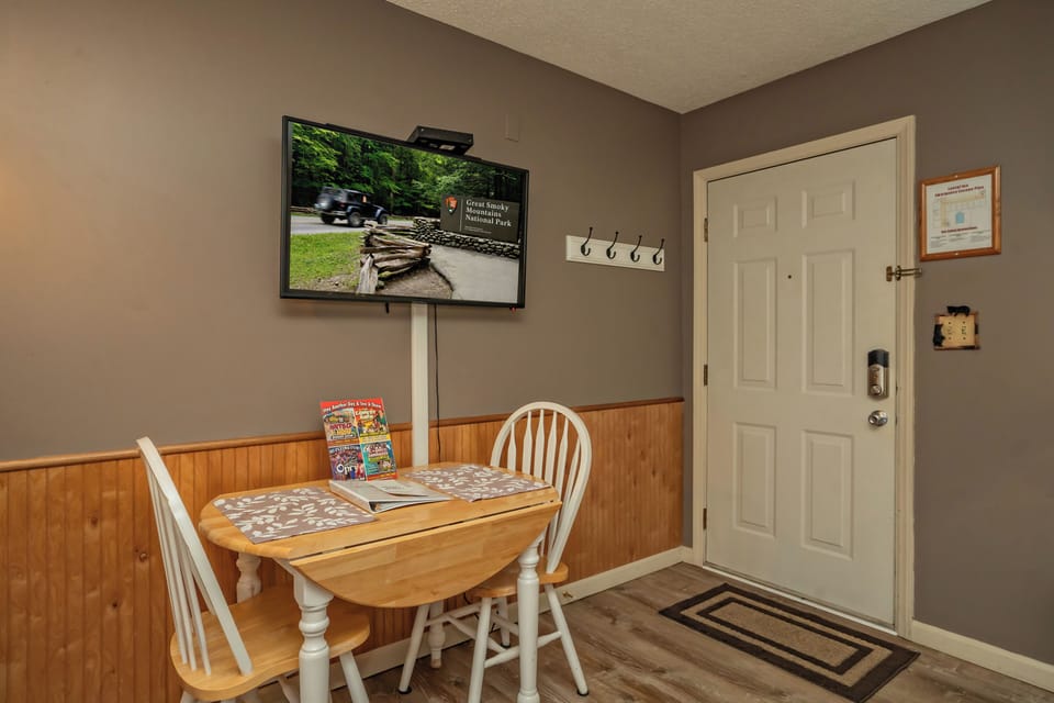 Step inside to your welcoming entryway with a cozy breakfast nook—perfect for your morning coffee and planning the day's adventures in the Smokies.