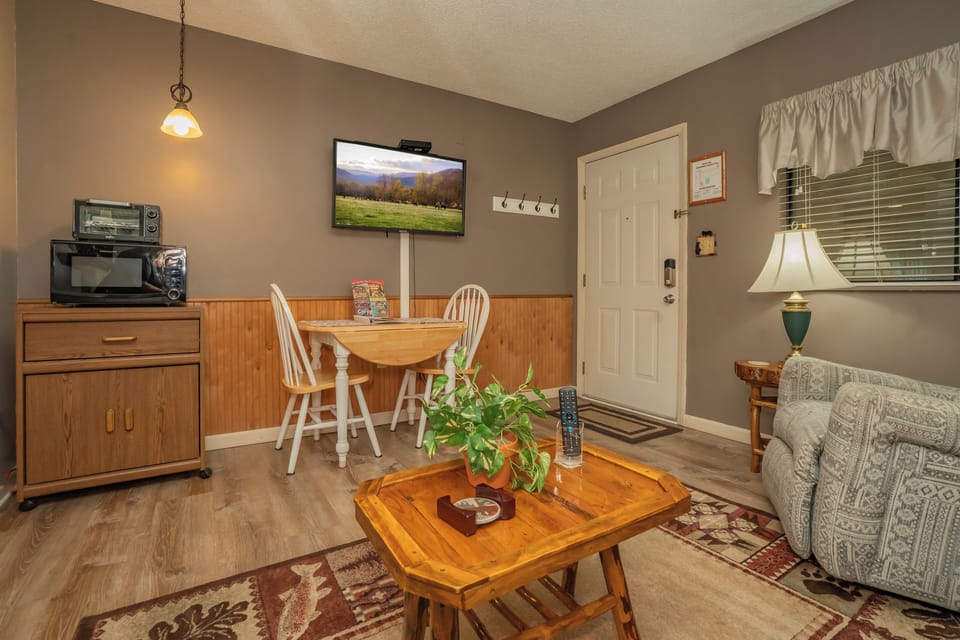Settle into your cozy retreat with warm wood accents and everything you need to feel at home—perfect for relaxing after a day of adventure.
