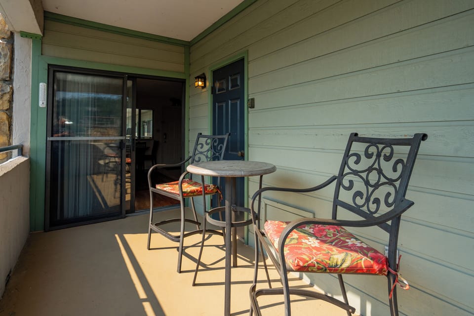 Step outside to your private balcony and breathe in the fresh mountain air. The cozy seating area invites you to sip your morning coffee or unwind with an evening drink while taking in the peaceful surroundings.