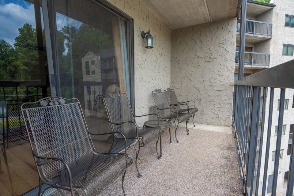 Relax on your private balcony with wrought-iron seating for two. The covered outdoor space gives you a peaceful spot to enjoy morning coffee or evening breezes while taking in views of the surrounding area.