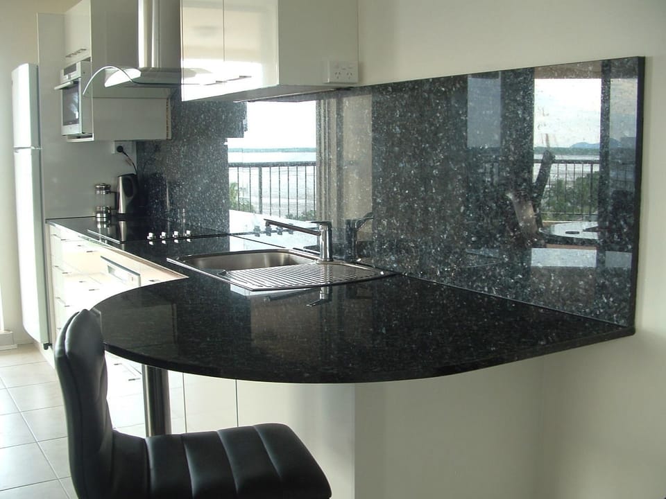 Panoramic Apartment | Private kitchen | Full-size fridge, microwave, oven, stovetop