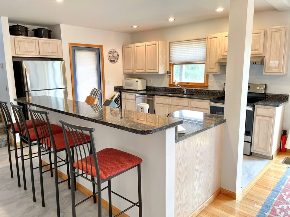 Kitchen, First Floor with Screened Porch and Deck Access