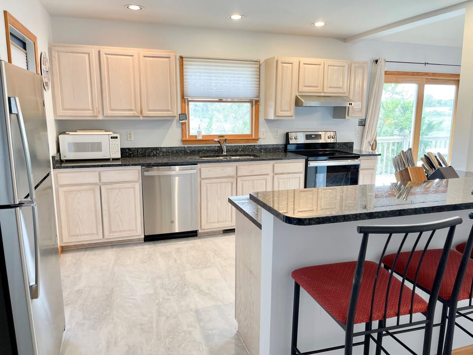 Kitchen, First Floor with Screened Porch and Deck Access