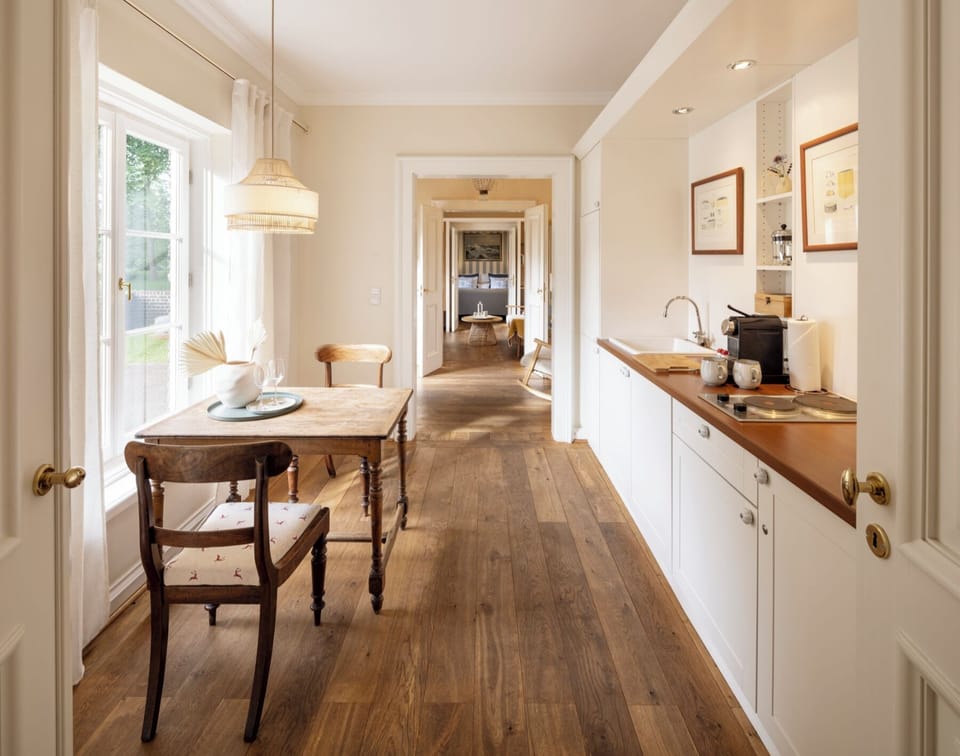 Deluxe Apartment | Private kitchen | Coffee/tea maker, electric kettle, cookware/dishes/utensils