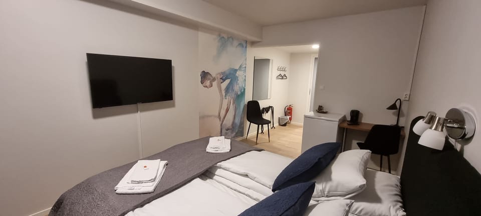 Basic Double Room | Pillowtop beds, desk, laptop workspace, blackout drapes