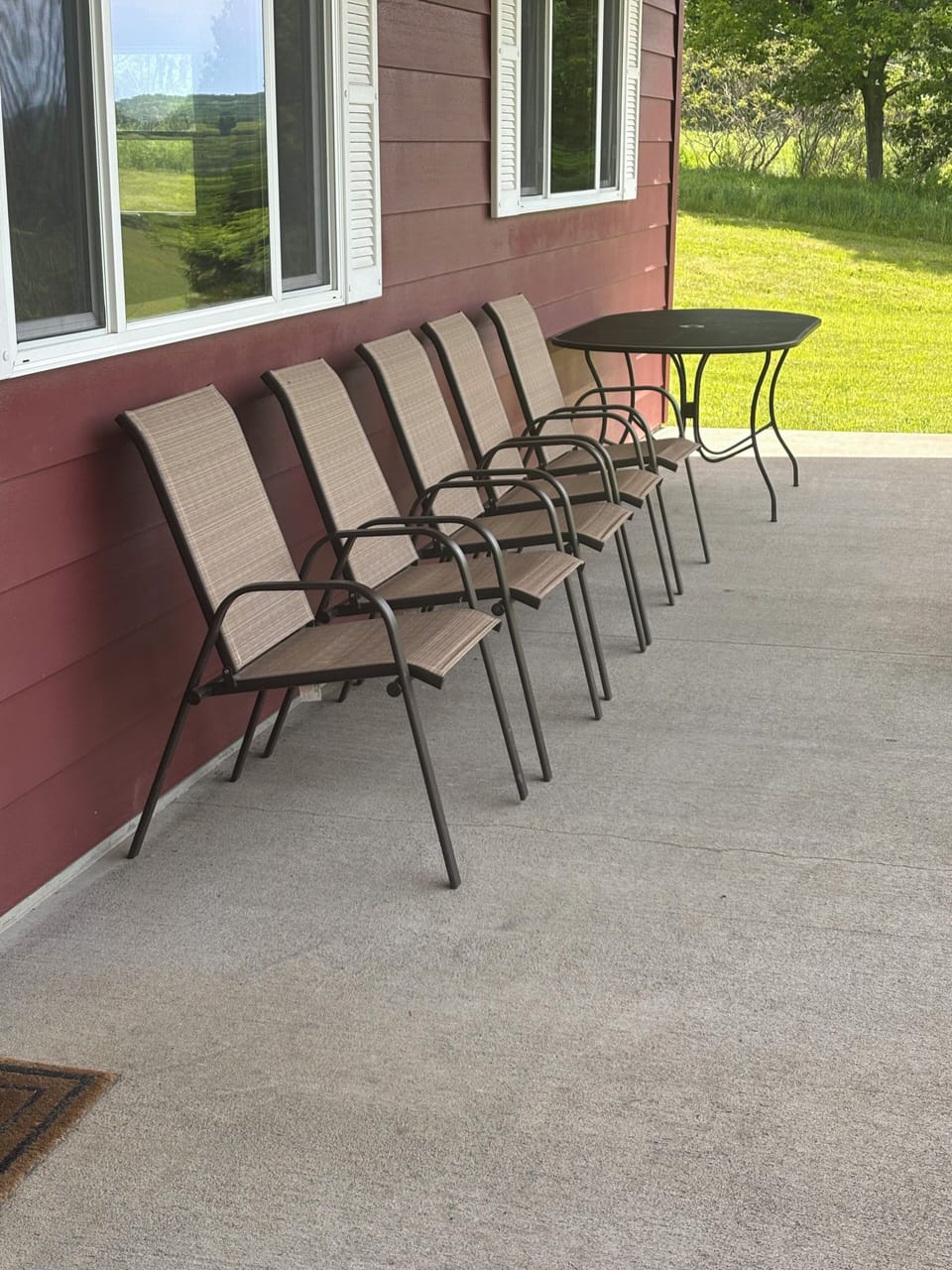 Table and seating under covered porch