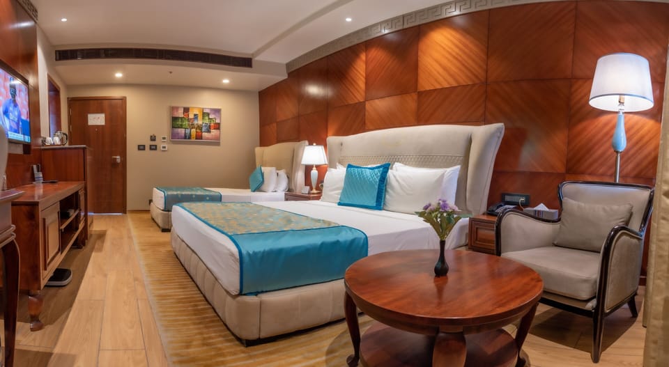 Executive Triple Room | Egyptian cotton sheets, premium bedding, Select Comfort beds, minibar