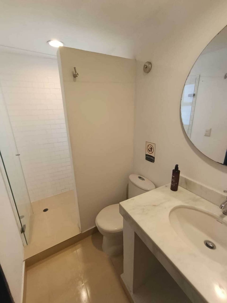 Shower, towels, soap, toilet paper