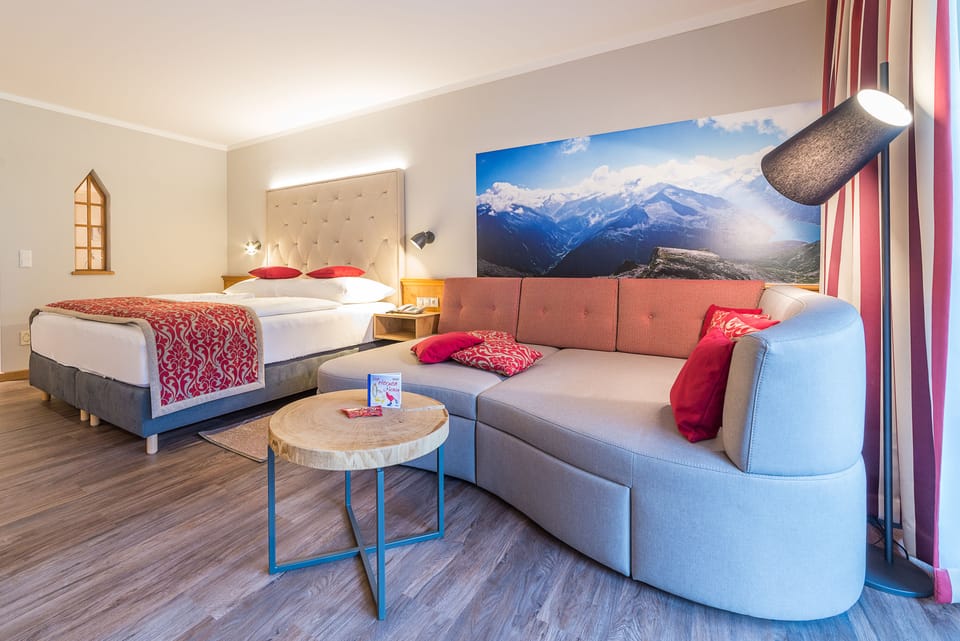 Suite, Balcony (Kuschelnest) | Hypo-allergenic bedding, minibar, in-room safe, desk