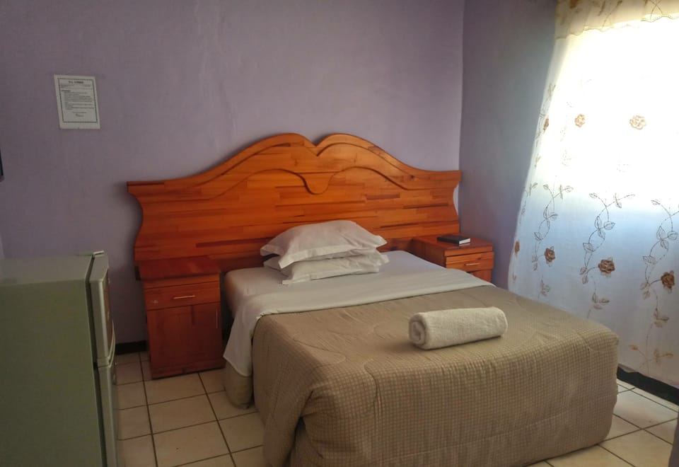 Desk, laptop workspace, iron/ironing board, rollaway beds