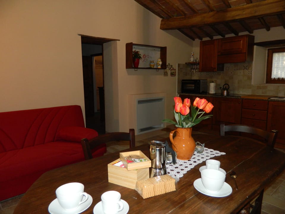 Apartment, 1 Bedroom (Granaio) | Private kitchen | Fridge, oven, stovetop, coffee/tea maker