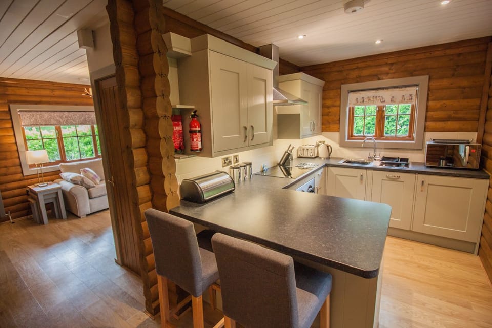 Fully fitted kitchen with breakfast bar