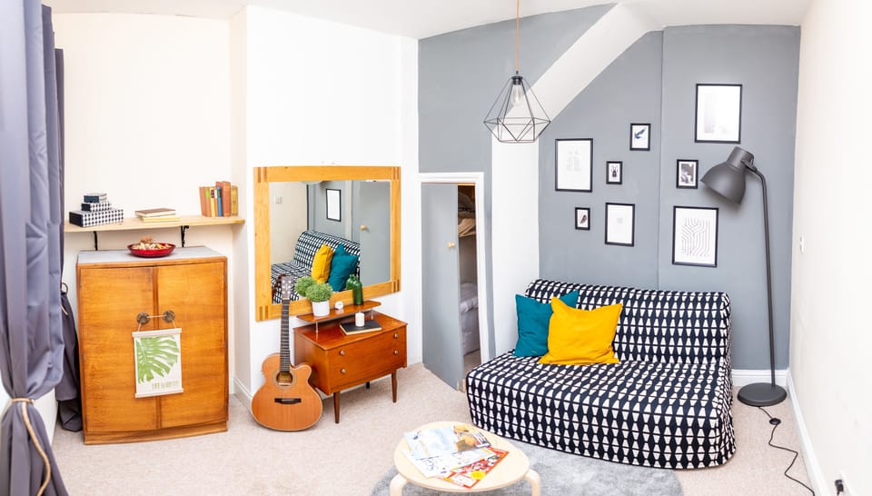 Three-Bedroom Apartment | Living area | 40-inch Smart TV with digital channels, Netflix, streaming services