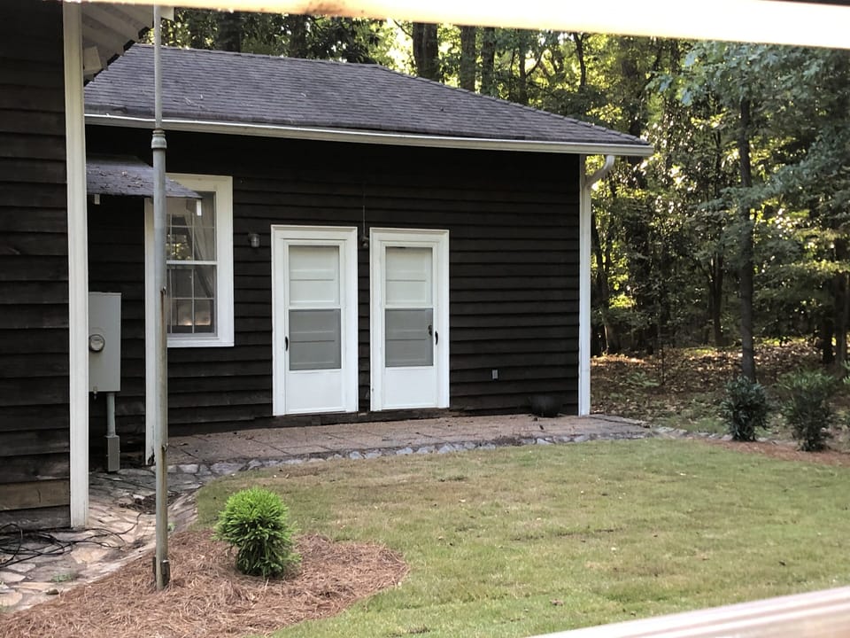 side door to kitchen/ dining- grilling patio