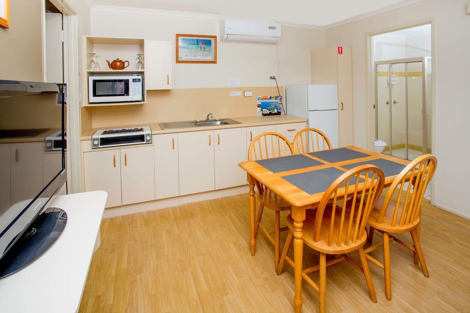 Standard 2 Bedroom Family Cabin-Sleeps 6 | Living room | TV, DVD player
