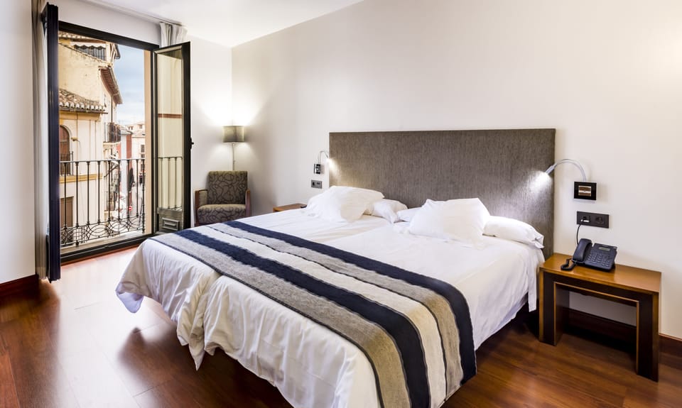 Down comforters, minibar, in-room safe, desk