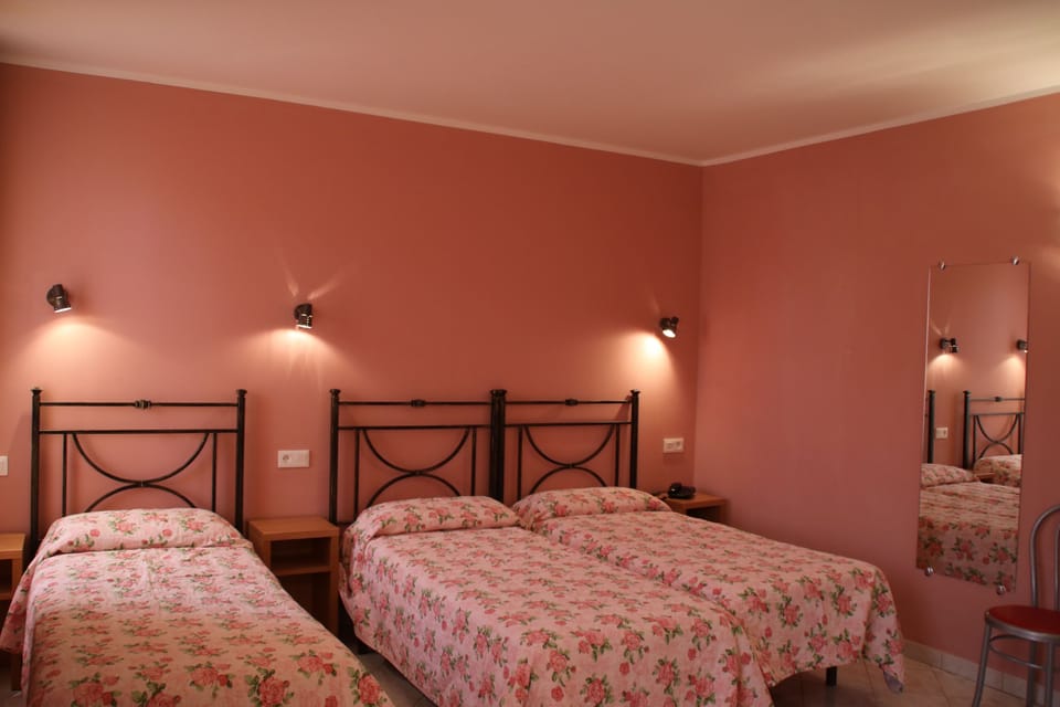 Triple Room | Down comforters, desk, blackout drapes, free WiFi