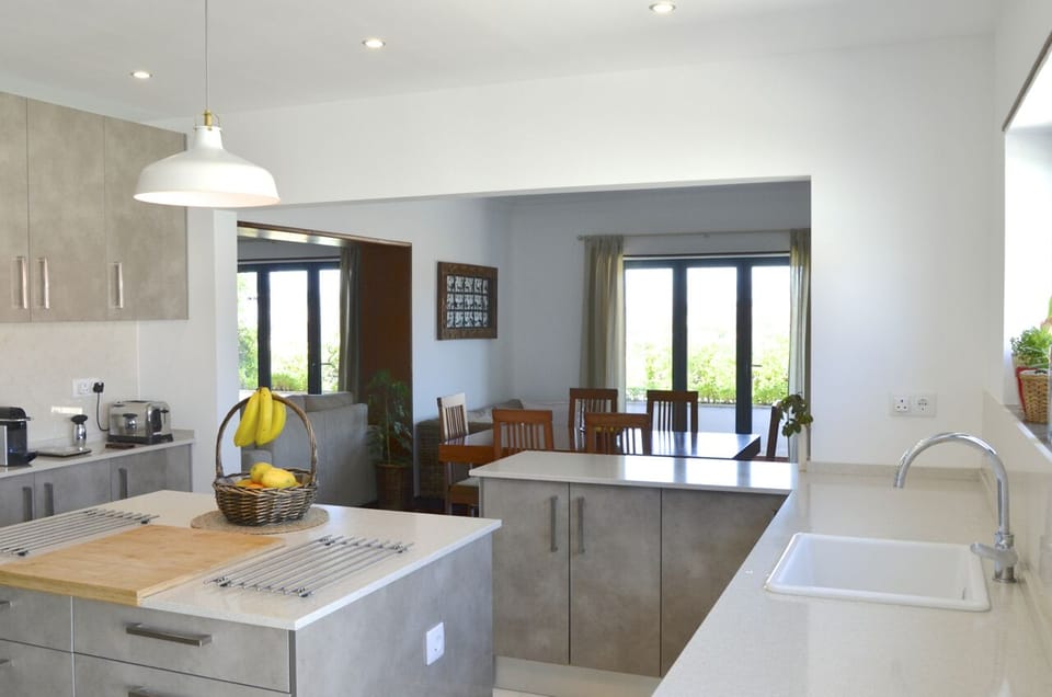 Kitchen which opens out to Dining Room