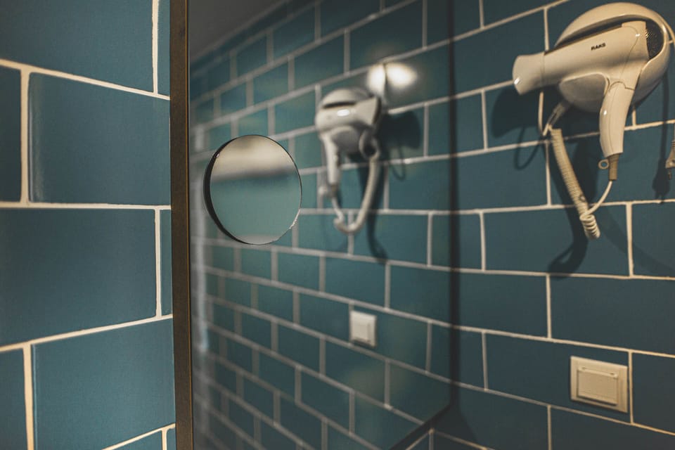 Shower, slippers, bidet, towels