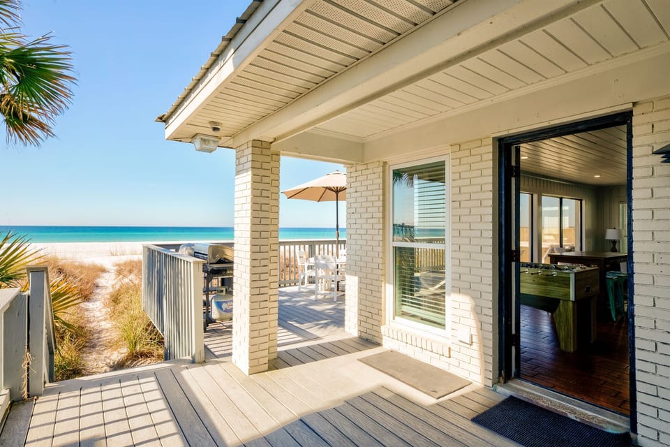 Along the left side of the home - path straight to the beach!
